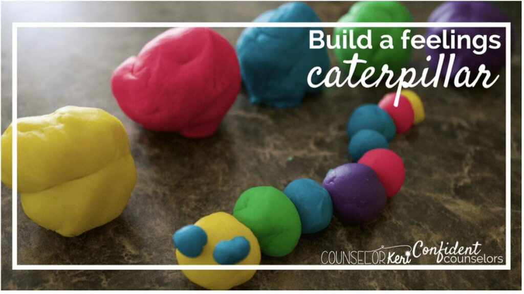 A feelings caterpillar made from balls of colorful play dough